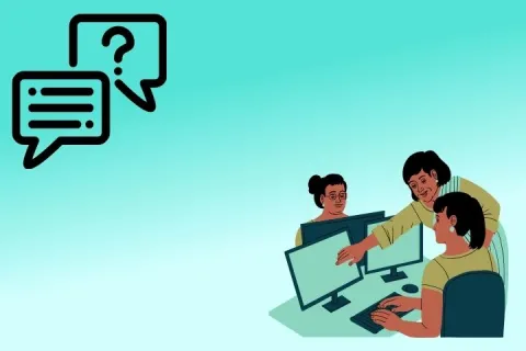 A person helping two people on computers